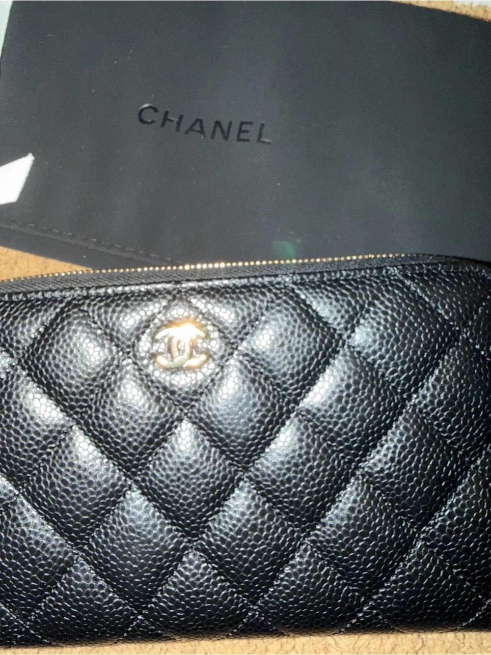 CHANEL Black Quilted Caviar Leather Zip Around Wallet with Gold CC
